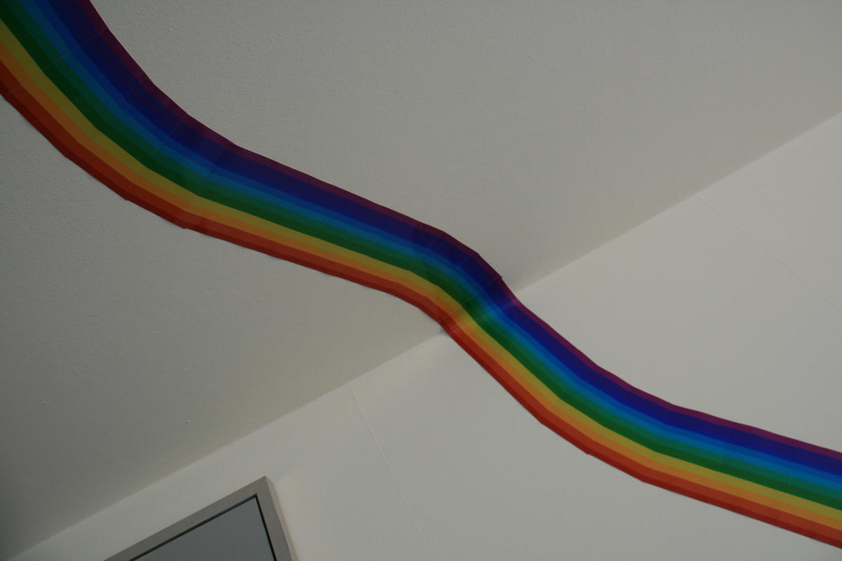 A rainbow made from small pictures